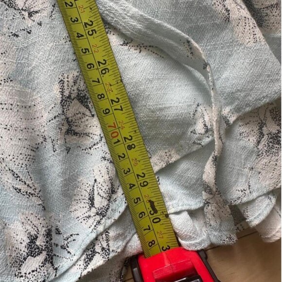 Soft and romantic wrap mini dress in a pale blue floral print by Free People - Picture 6 of 8